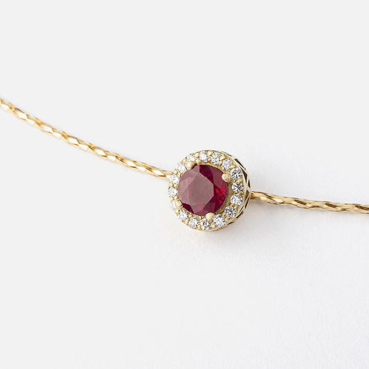 Yellow gold, ruby and diamonds Charm